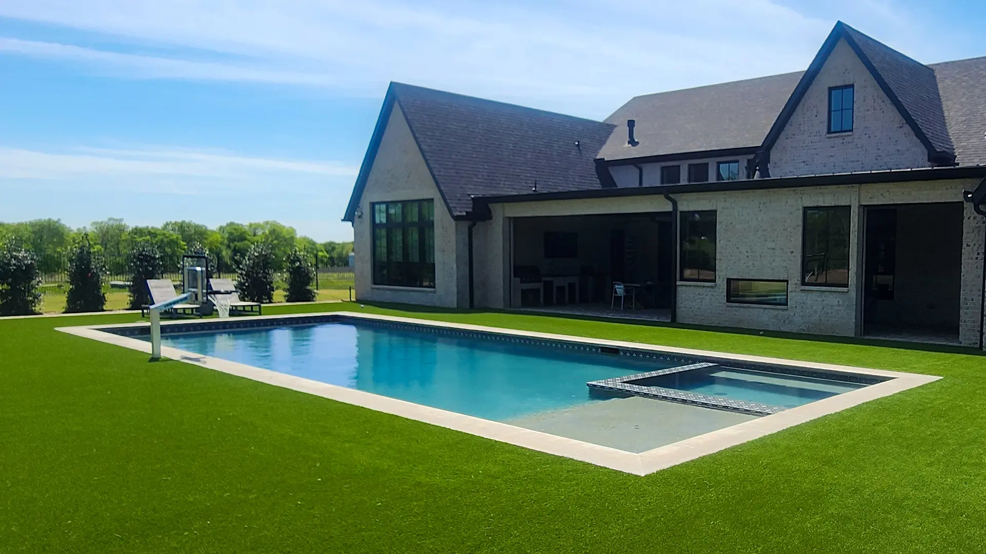 Geometric Pool and Spa with Basketball Hoop