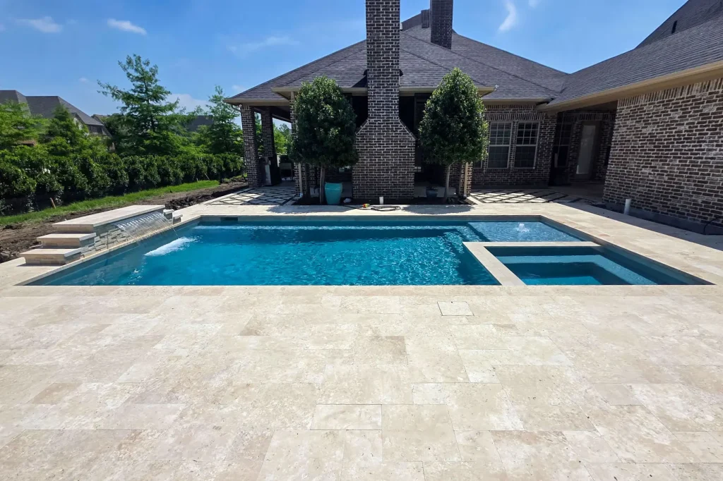 Geometric Pool with Travertine Deck