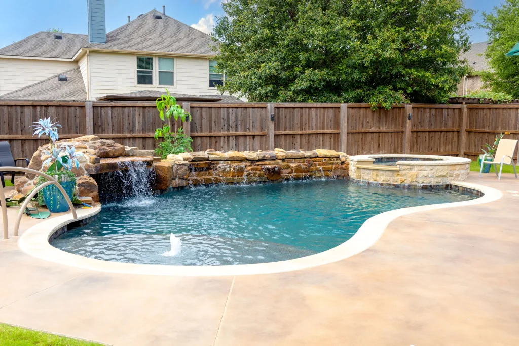 Freeform Pool With Grotto and Weeping Wall